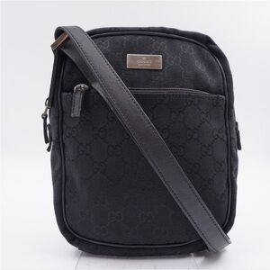 Gucci monogram messenger crossbody bag in black